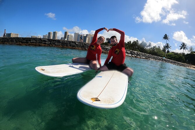 Family, Private & Group Surfing Lessons, Waikiki Courtesy Shuttle - Instructor coaching on the water: what you’ll actually practice