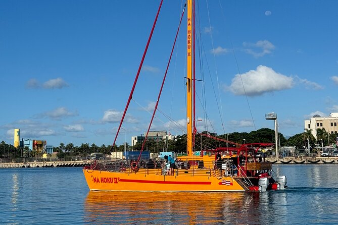 Honolulu Sunset Sail from Kewalo Harbor Including Drinks - The deck experience: music, seating, and staying comfortable on a sunset sail