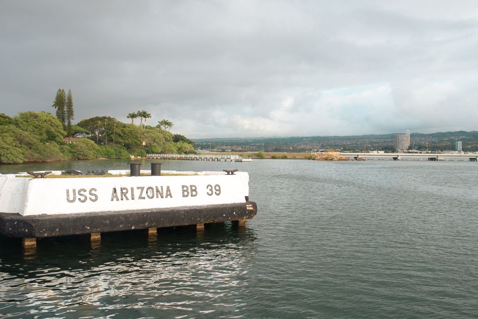 Oahu: Pearl Harbor, USS Arizona, and City Highlights Tour - Punchbowl and the Courts of the Missing: reflection from the bus