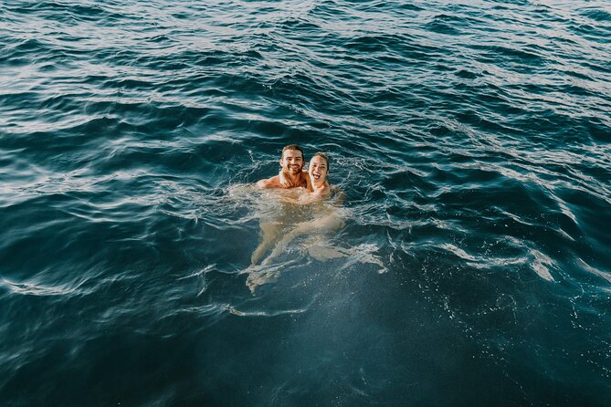 Paradise Waikiki Sunset Cruise + LIVE DJ + SWIMMING - Crew energy and safety on a party boat