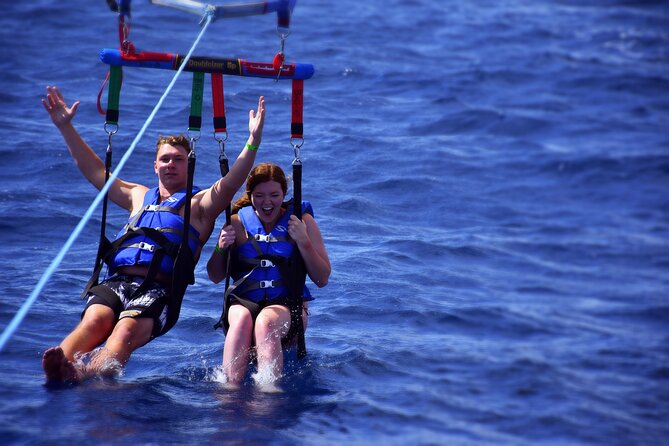 Parasailing in Waikiki from Oahu Hawaii - Motion sickness and the water dip: plan for the body, not just the view